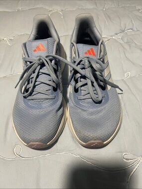 adidas Women's Light Blue Athletic Runners with Orange Logo